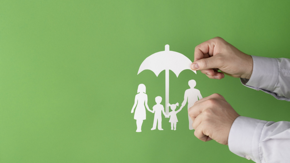 hands-holding-paper-family-close-up
